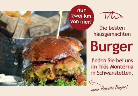 plakat-verkauft.de_restaurant_burger Plakatmotiv des Restaurants Trós Montérna in Schwanstetten mit Nahaufnahme eines Burgers. Hinweis auf hausgemachte Burger und Nähe zum Standort (nur 2 km entfernt).
