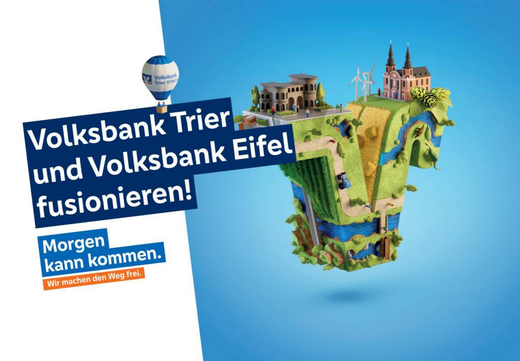 3D-Landschaft in Form des Volksbank-„V“ mit Gebäuden, Wegen, Feldern, Wasserläufen und einem Heißluftballon. Aufschrift: „Volksbank Trier und Volksbank Eifel fusionieren!“ sowie der Slogan „Morgen kann kommen. Wir machen den Weg frei.“